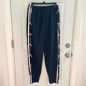NWOT honey peach trendy striped track pants with cutie pink bows size large